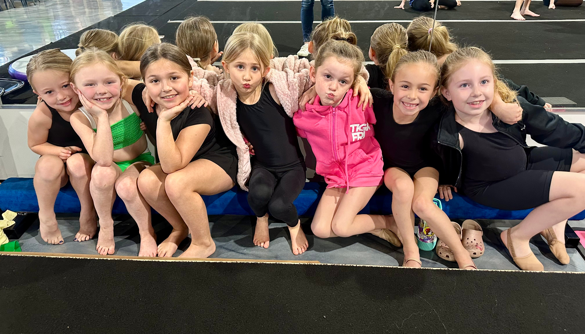 Wakulla competition dancers on the bench